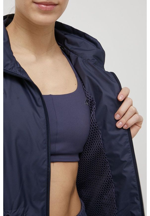 adidas Performance kurtka damska kolor granatowy przejściowa. Okazja: na co dzień. Kolor: niebieski. Materiał: materiał. Wzór: gładki. Styl: casual