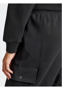 Adidas - adidas Spodnie dresowe ALL SZN Fleece Cargo IW1215 Czarny Loose Fit. Kolor: czarny. Materiał: bawełna #5