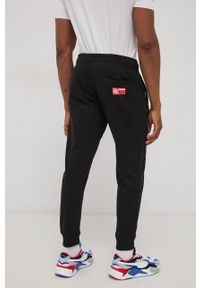 Superdry Spodnie bawełniane męskie kolor czarny z aplikacją. Kolor: czarny. Materiał: bawełna. Wzór: aplikacja