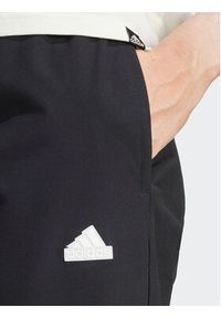 Adidas - adidas Spodnie dresowe City Escape IT8814 Czarny Regular Fit. Kolor: czarny. Materiał: syntetyk #3