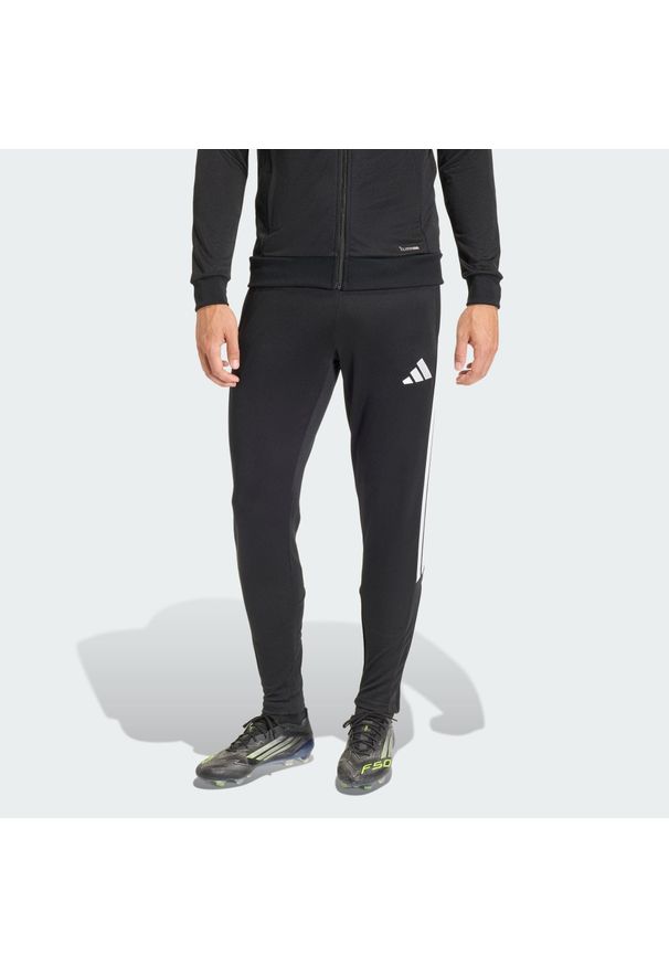Adidas - Spodnie treningowe Tiro 26 League. Kolor: czarny, biały, wielokolorowy. Technologia: ClimaCool (Adidas). Sport: piłka nożna