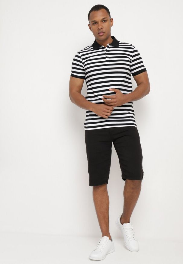 Born2be - Czarne Bawełniane Szorty z Wywiniętymi Nogawkami i Paskiem z Ekoskóry Zapinane na Suwak Wannesia. Okazja: na co dzień. Kolor: czarny. Materiał: bawełna. Styl: casual, klasyczny