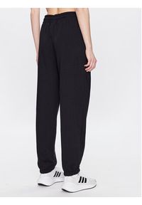 New Balance Spodnie dresowe WP31530 Czarny Relaxed Fit. Kolor: czarny. Materiał: bawełna, dresówka #5