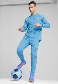Puma - Męskie spodnie treningowe Manchester City PUMA Magic Blue Yellow Glow. Kolor: żółty, wielokolorowy, niebieski