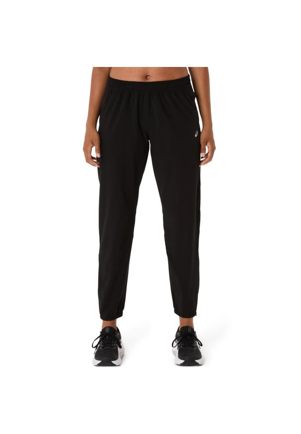 Damskie spodnie dresowe Asics Core. Kolor: czarny. Materiał: dresówka. Długość: długie
