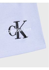 Calvin Klein Jeans Spódnica Monogram Off Placed IG0IG01578 Fioletowy Regular Fit. Kolor: fioletowy. Materiał: bawełna