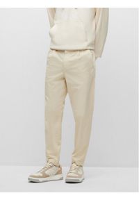 BOSS - Boss Spodnie materiałowe 50489106 Beżowy Relaxed Fit. Kolor: beżowy. Materiał: bawełna #1