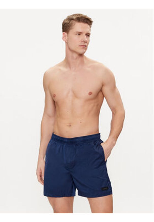 Calvin Klein Swimwear Szorty kąpielowe KM0KM00939 Granatowy Regular Fit. Kolor: niebieski. Materiał: syntetyk