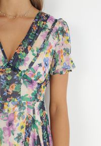 Born2be - Beżowo-Zielona Sukienka Maxi z Asymetrycznym Dołem w Kwiaty Angla. Okazja: na co dzień. Typ kołnierza: dekolt w kształcie V. Kolor: beżowy. Długość rękawa: krótki rękaw. Wzór: kwiaty. Typ sukienki: asymetryczne. Styl: casual. Długość: maxi #6