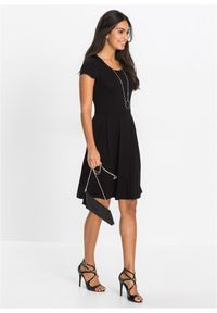 bonprix - Sukienka z dżerseju z mieszanki wiskozy. Kolor: czarny. Materiał: jersey, wiskoza. Długość rękawa: krótki rękaw. Wzór: gładki, nadruk, grochy, paski. Sezon: lato #1