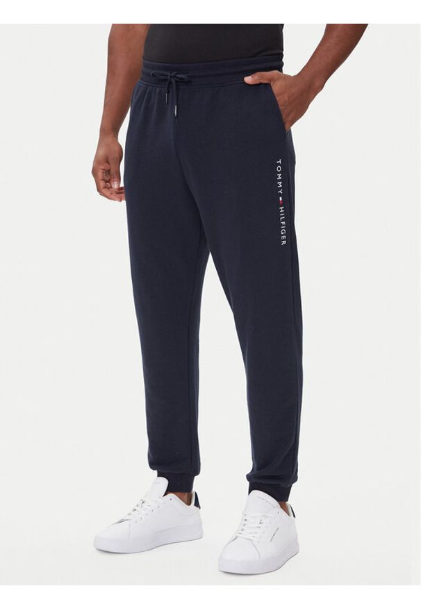 TOMMY HILFIGER - Tommy Hilfiger Spodnie dresowe UM0UM03664 Granatowy Regular Fit. Kolor: niebieski. Materiał: bawełna