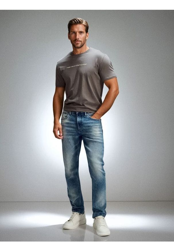 Sinsay - Jeansy slim fit z efektem sprania - niebieski. Kolor: niebieski