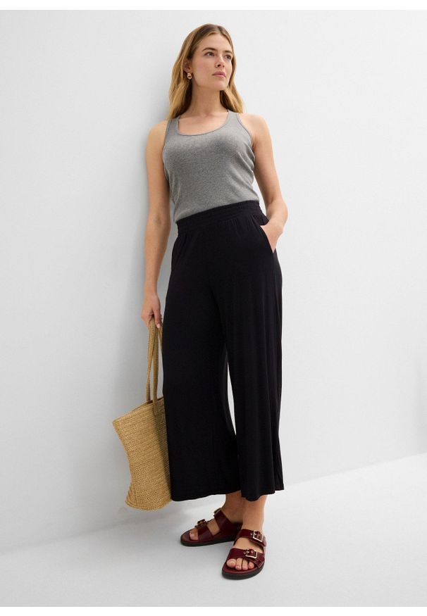 bonprix - Spodnie z dżerseju 7/8, z lejącej mieszanki wiskozy. Kolor: czarny. Materiał: wiskoza, jersey