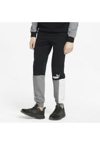 Puma - Męskie spodnie dresowe z blokami kolorów Essentials Camo PUMA Black. Kolor: szary, wielokolorowy, czarny. Materiał: dresówka. Sport: joga i pilates #2