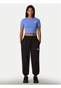 The North Face Spodnie dresowe Essential NF0A8C1G Czarny Relaxed Fit. Kolor: czarny. Materiał: syntetyk, bawełna #4