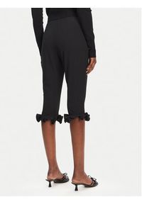 ROTATE Spodnie capri 113809100 Czarny Slim Fit. Kolor: czarny. Materiał: wiskoza #3