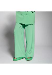 Sinsay - Spodnie loose high waist - Zielony. Stan: podwyższony. Kolor: zielony #1