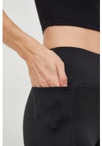 Reebok legginsy do biegania damskie kolor czarny z nadrukiem. Kolor: czarny. Materiał: poliester, skóra, dzianina, materiał. Wzór: nadruk #2