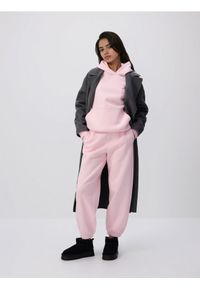 Reserved - Spodnie dresowe ze ściągaczami - pastelowy róż. Kolor: różowy. Materiał: dresówka