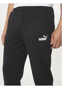 Puma Spodnie dresowe Ess Logo 586716 Czarny Regular Fit. Kolor: czarny. Materiał: bawełna, syntetyk