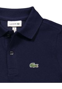 Lacoste - LACOSTE - Granatowa koszulka polo Regular Fit. Typ kołnierza: polo. Kolor: niebieski. Materiał: prążkowany, bawełna