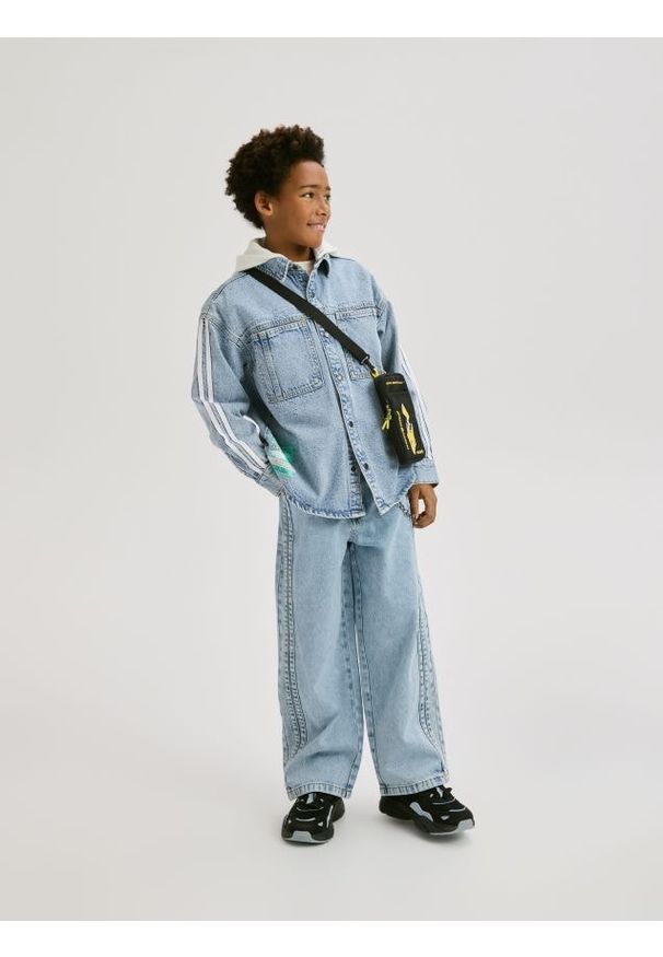 Reserved - Jeansy baggy - niebieski. Kolor: niebieski