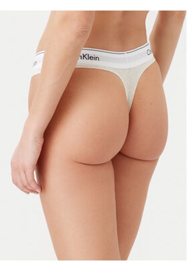 Calvin Klein Underwear Stringi 0000F3786E Beżowy. Kolor: beżowy. Materiał: bawełna