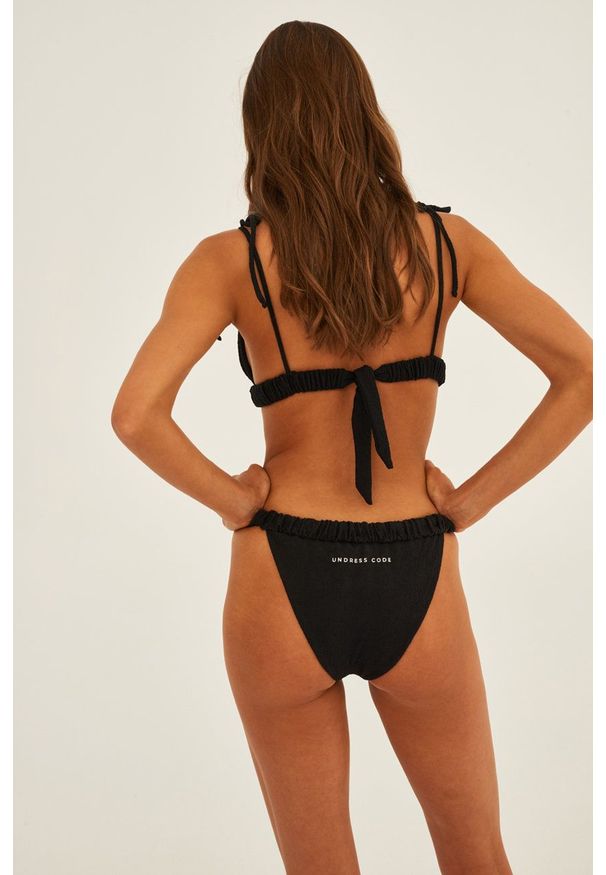 Undress Code biustonosz kąpielowy kolor czarny lekko usztywniona miseczka. Kolor: czarny. Materiał: dzianina