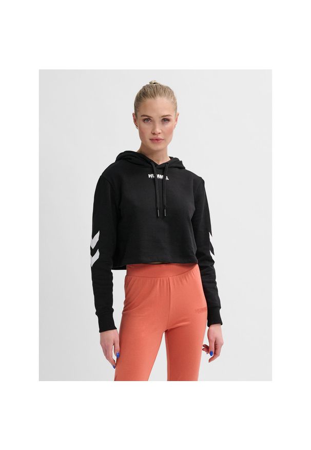 Damska bluza z kapturem Hummel hmlLEGACY cropped. Typ kołnierza: kaptur. Kolor: czarny. Materiał: bawełna, tkanina, materiał. Wzór: nadruk. Sport: fitness