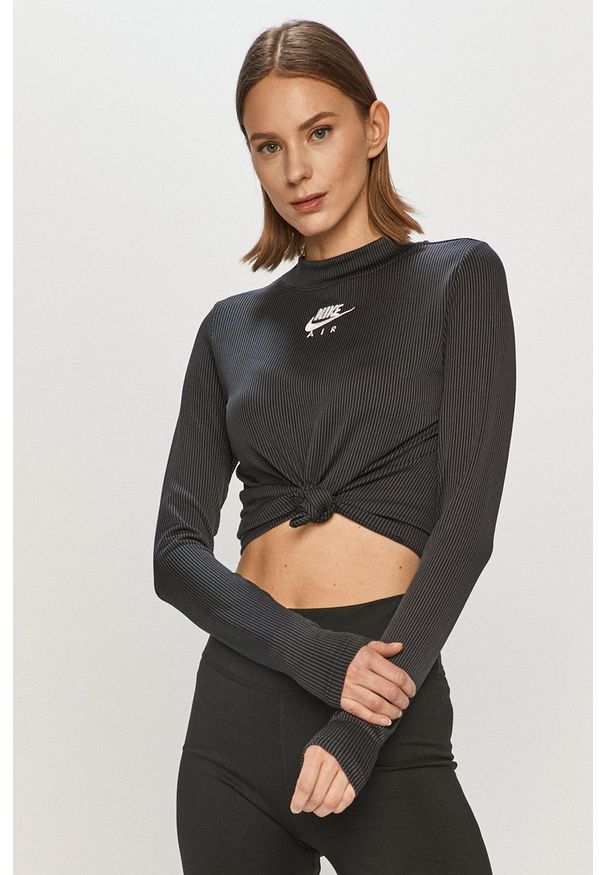 Nike Sportswear - Longsleeve. Okazja: na co dzień. Kolor: czarny. Materiał: dzianina, materiał. Długość rękawa: długi rękaw. Wzór: aplikacja. Styl: casual