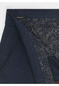 Pako Lorente - PAKO LORENTE – Granatowe spodnie męskie DORJE w delikatną kratę P000B-WX-213-G. Kolor: niebieski. Długość: długie. Styl: elegancki #9