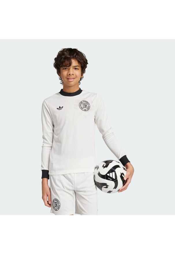 Adidas - Koszulka Germany Anniversary Long Sleeve Kids. Kolor: czarny, biały, wielokolorowy. Materiał: materiał. Długość rękawa: długi rękaw. Sport: piłka nożna