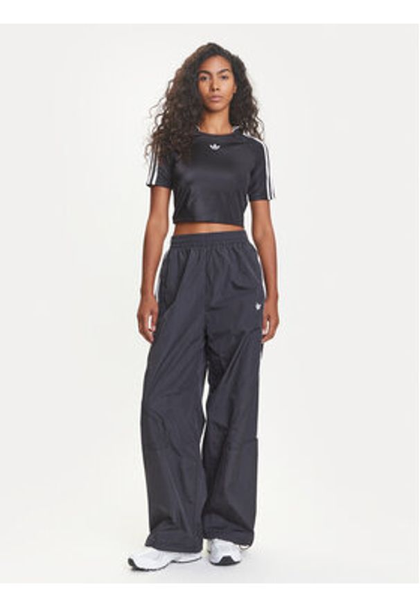 Adidas - adidas Spodnie dresowe adicolor Teamgeist JD0256 Czarny Oversize. Kolor: czarny. Materiał: syntetyk