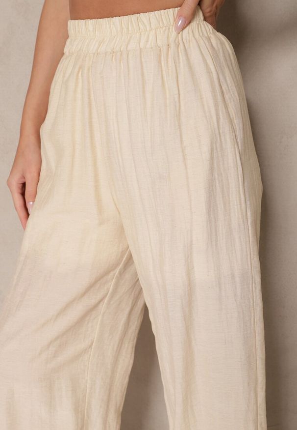 Renee - Jasnobeżowe Wiskozowe Spodnie Palazzo High Waist z Lnem Linaselia. Stan: podwyższony. Kolor: beżowy. Materiał: len, wiskoza. Sezon: lato