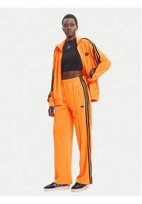 Adidas - adidas Spodnie dresowe adicolor Classic Firebird JY2694 Żółty Loose Fit. Kolor: żółty. Materiał: syntetyk #4