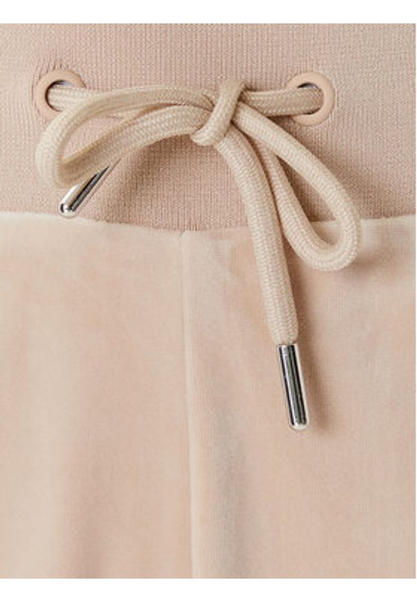 Guess Spodnie dresowe V3BB26 K0232 Beżowy Regular Fit. Kolor: beżowy. Materiał: syntetyk