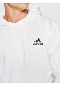 Adidas - adidas Bluza FeelCozy Hoodie H12211 Biały Regular Fit. Kolor: biały. Materiał: bawełna, syntetyk