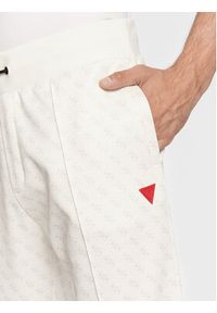Guess Spodnie dresowe Korbin Z2BB05 FL04Q Écru Regular Fit. Materiał: syntetyk, bawełna