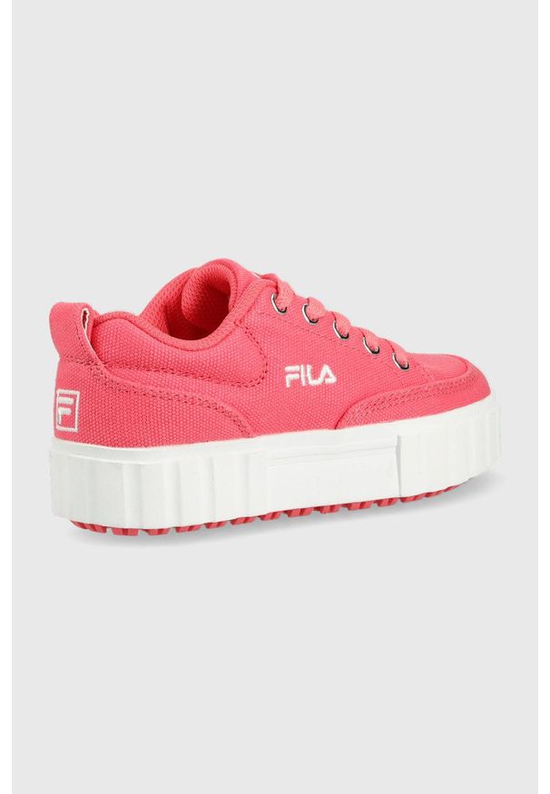 Fila tenisówki dziecięce kolor pomarańczowy. Nosek buta: okrągły. Zapięcie: sznurówki. Kolor: pomarańczowy. Materiał: guma. Obcas: na platformie