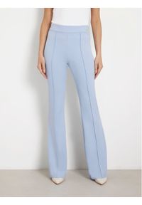 Guess Spodnie materiałowe W4YB01 KCBO2 Błękitny Slim Fit. Kolor: niebieski. Materiał: syntetyk