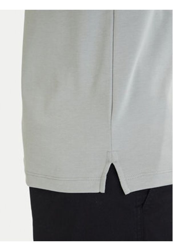 Calvin Klein Polo LV04LB276G Turkusowy Regular Fit. Typ kołnierza: polo. Kolor: turkusowy. Materiał: bawełna