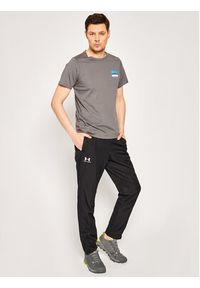 Under Armour Spodnie outdoor Vital Woven 1352031 Czarny Loose Fit. Kolor: czarny. Materiał: syntetyk. Sport: outdoor