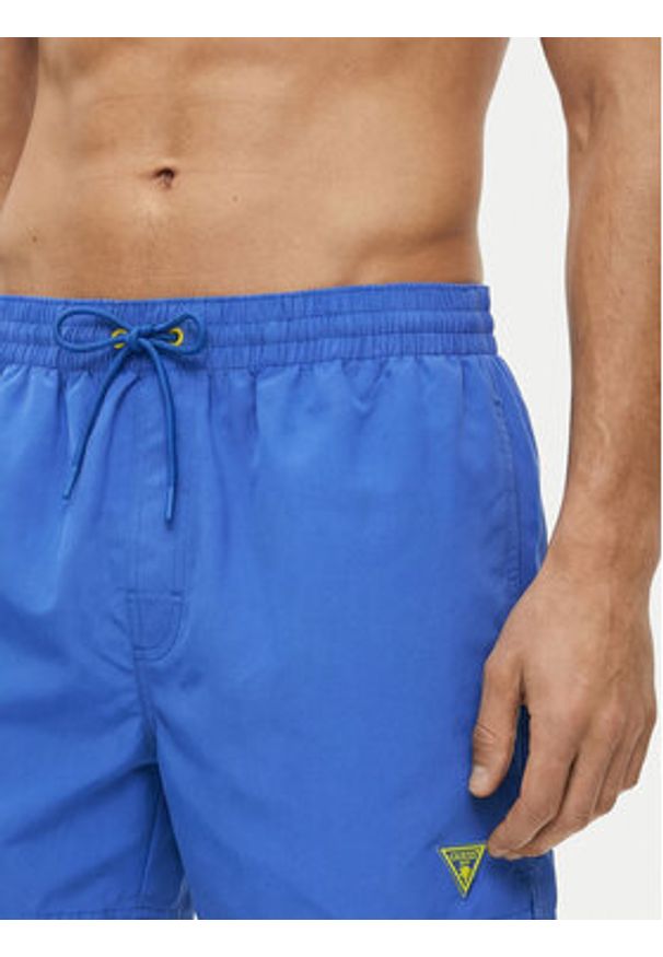 Guess Szorty kąpielowe F6GT25 WG282 SHORT Niebieski Regular Fit. Kolor: niebieski. Materiał: syntetyk