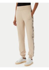 Guess Spodnie dresowe V2YB15 KB3P2 Beżowy Regular Fit. Kolor: beżowy. Materiał: bawełna #1