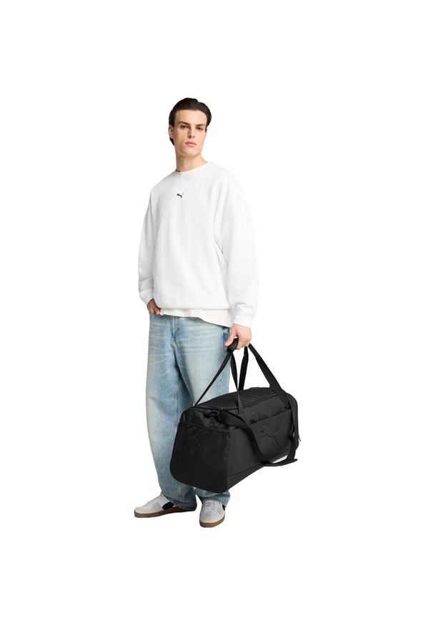 Torba Puma Buzz Medium Sports Bag 58L, Dla obu płci. Kolor: czarny. Materiał: poliester, materiał. Sport: fitness