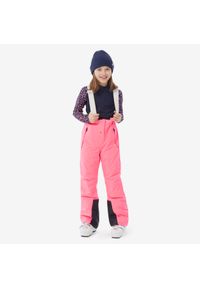 WEDZE - Spodnie narciarskie dla dzieci Wedze PNF 900. Stan: podwyższony. Kolor: różowy. Materiał: tkanina, dzianina. Sport: narciarstwo