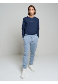 Big-Star - Spodnie dresowe męskie z bawełny organicznej niebieskie William 400. Kolor: niebieski. Materiał: bawełna, dresówka. Wzór: nadruk, aplikacja #4