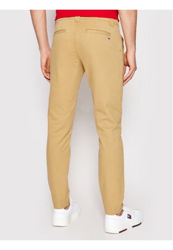 Tommy Jeans Chinosy Scanton DM0DM09595 Brązowy Slim Fit. Kolor: brązowy. Materiał: bawełna