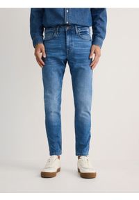 Reserved - Jeansy skinny z efektem sprania - niebieski. Kolor: niebieski