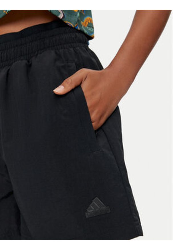 Adidas - adidas Szorty sportowe City Escape Woven IV9782 Czarny Loose Fit. Kolor: czarny. Materiał: syntetyk